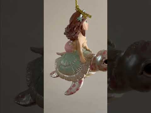 Mermaids riding sea animals